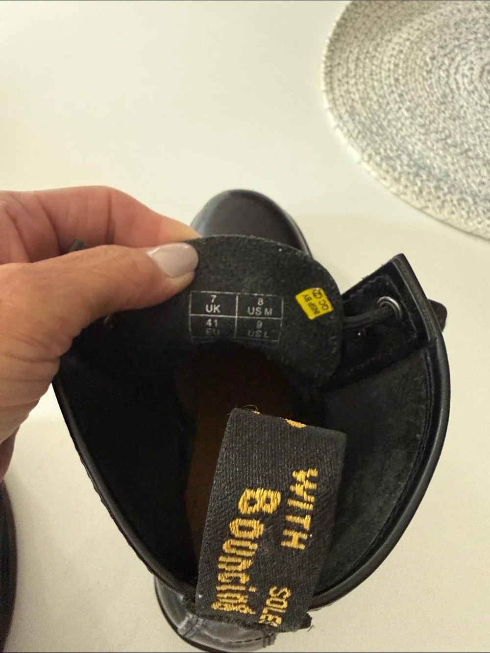 Dr. Martens Black Leather 8-Eye Lace-Up Boots with Yellow Stitching